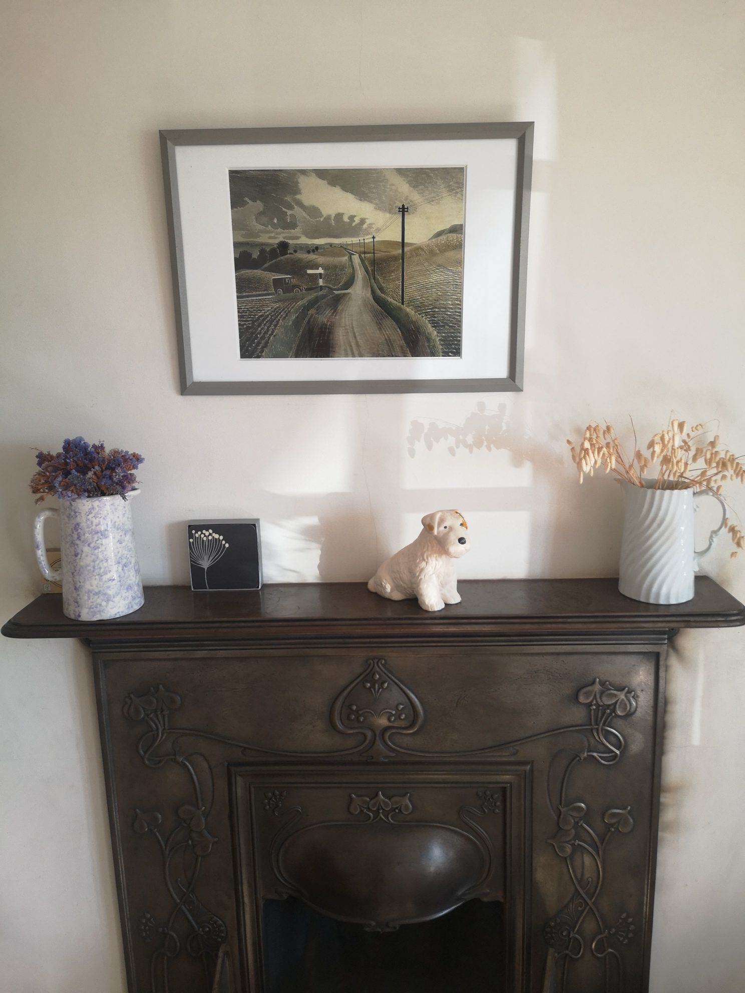 Living room mantelpiece at the Castle Acre Holiday Cottage