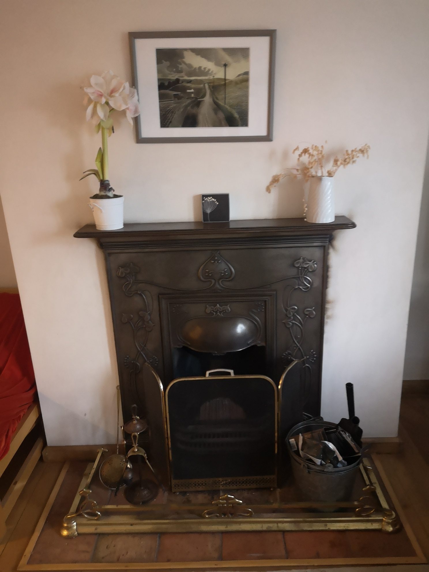 Close up of traditional fireplace in Castle Acre holiday let